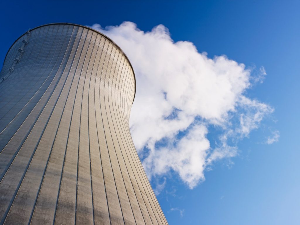 Meta signs deals with three nuclear companies for 6-plus GW of power Cooling tower at nuclear power plant emits steam.