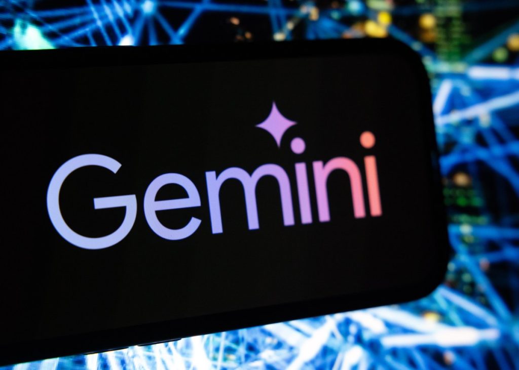Google’s more affordable AI Plus plan rolls out to all markets, including the U.S. The Google Gemini generative AI logo on a smartphone.