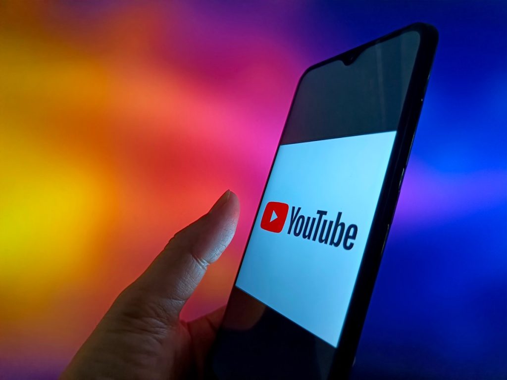 Google’s subscriptions rise in Q4 as YouTube pulls $60B in yearly revenue An illustration photo shows YouTube logo in a smartphone