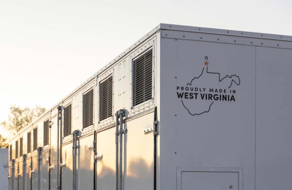 Google paid startup Form Energy $1B for its massive 100-hour battery A grid-scale battery stands against a clear sky.