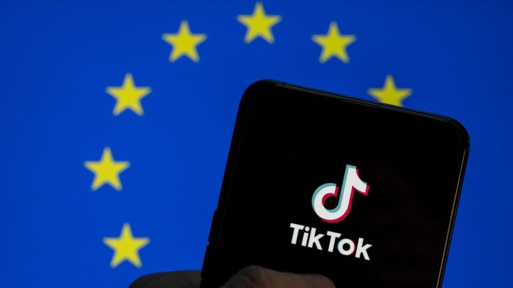 EU says TikTok must disable ‘addictive’ features like infinite scroll, fix its recommendation engine TikTok logo seen on an Android mobile device screen with the European Union (EU) flag in the background.
