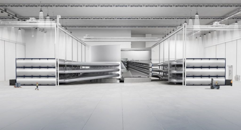 A cutaway illustration shows the different parts of Pacific Fusion's reactor design.
