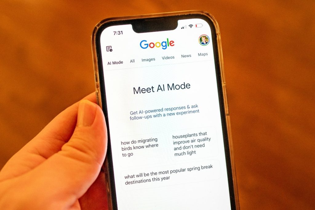 Google Search rolls out Gemini’s Canvas in AI Mode to all US users A person holding an iPhone and using Google AI Mode