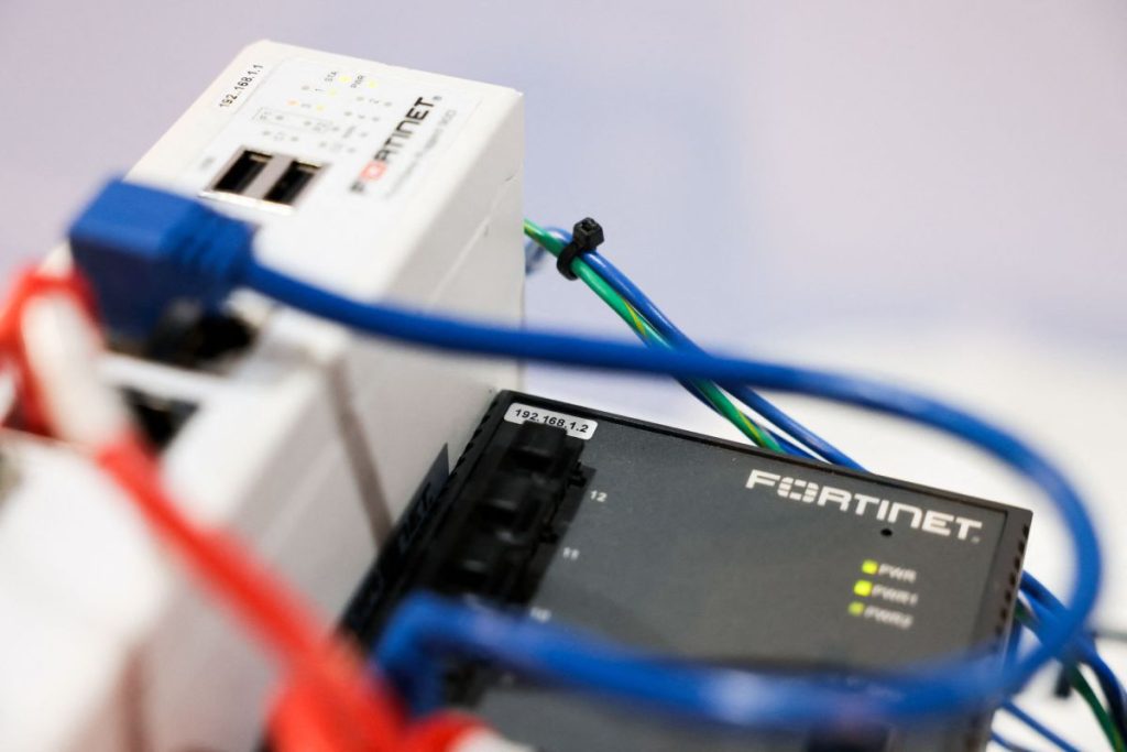 Cybercriminals allegedly hacked tens of thousands of Fortinet firewalls used by major companies all over the world A device designed to detect hacks manufactured by cybersecurity firm Fortinet.