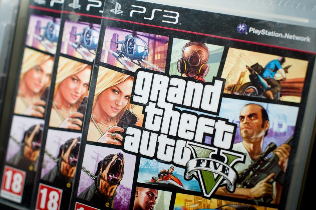 Grand Theft Auto V cheat service gets hacked, exposing thousands of gamers Close view of the packaging of the console game Grand Theft Auto 5.