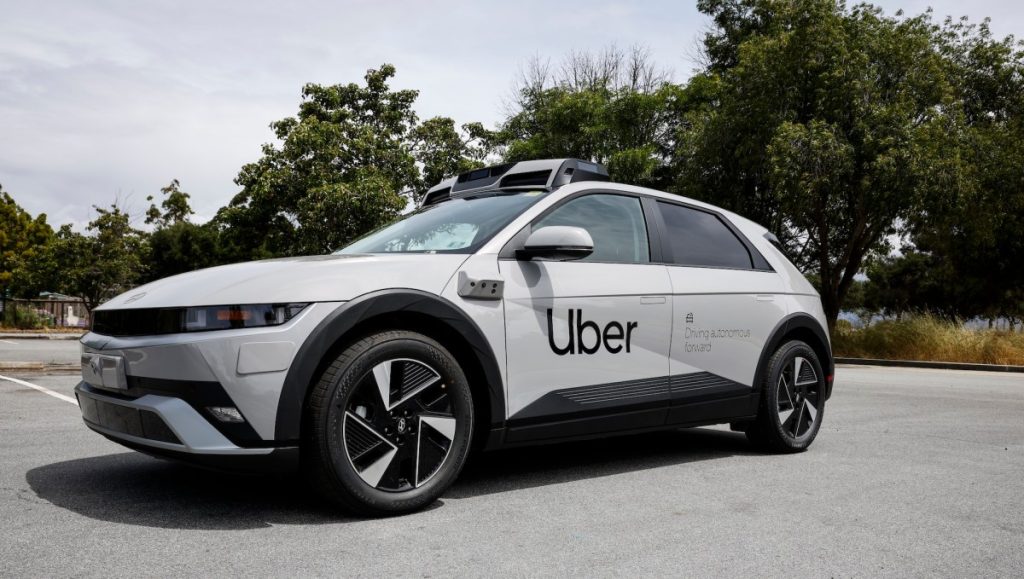 white Uber X, parked