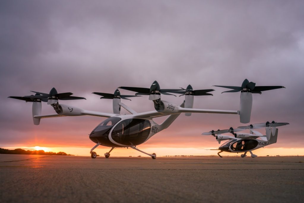 Florida plans to build air taxi pads using $200M intended for EV chargers two joby aviation evtols set in front of a sunset