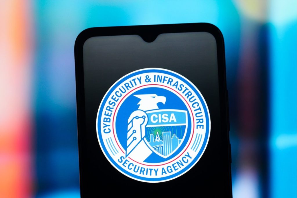 US cyber agency CISA had to build its incident playbook during the incident, agency reveals CISA logo on a smartphone